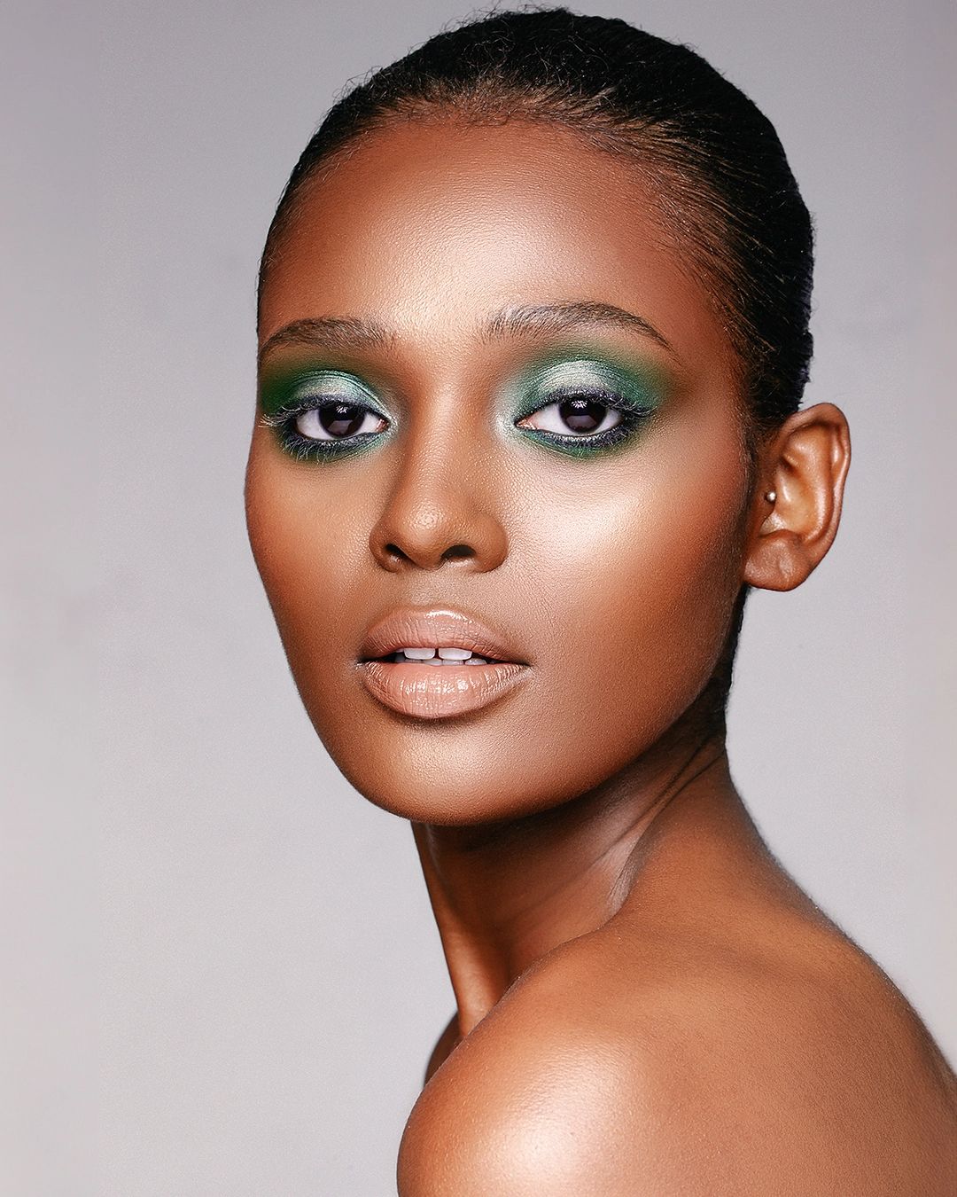 Retouched image showing radiant skin and soft golden highlights